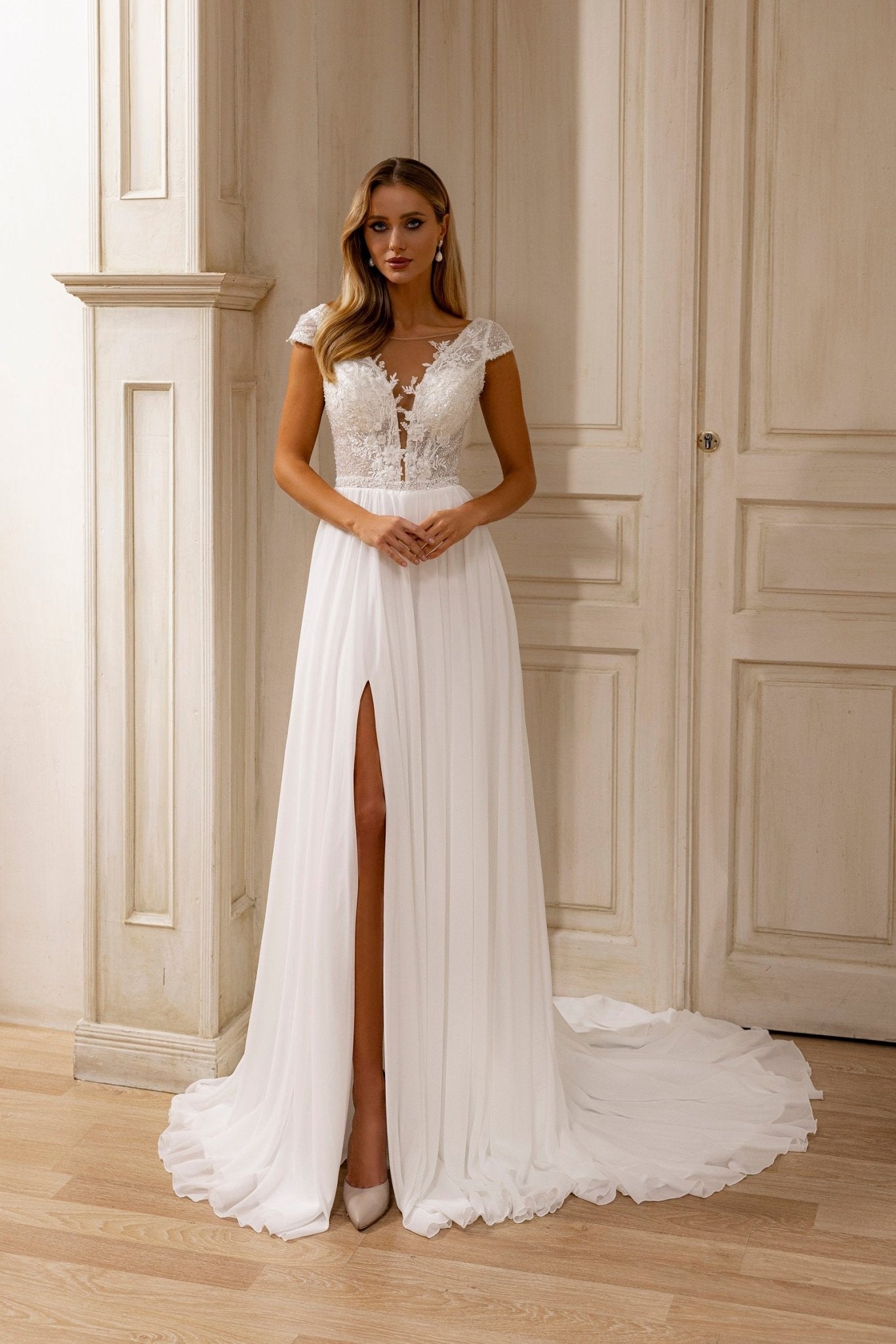 Sophisticated A-Line Wedding Dress with Lace Embellishments and Sheer Overlay Train - WonderlandByLilian