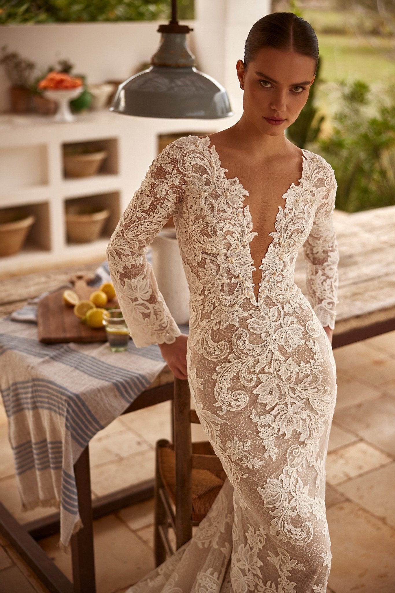 Sophisticated Lace Mermaid Wedding Gown with Deep V-Neck and Long Sleeves Plus Size - WonderlandByLilian