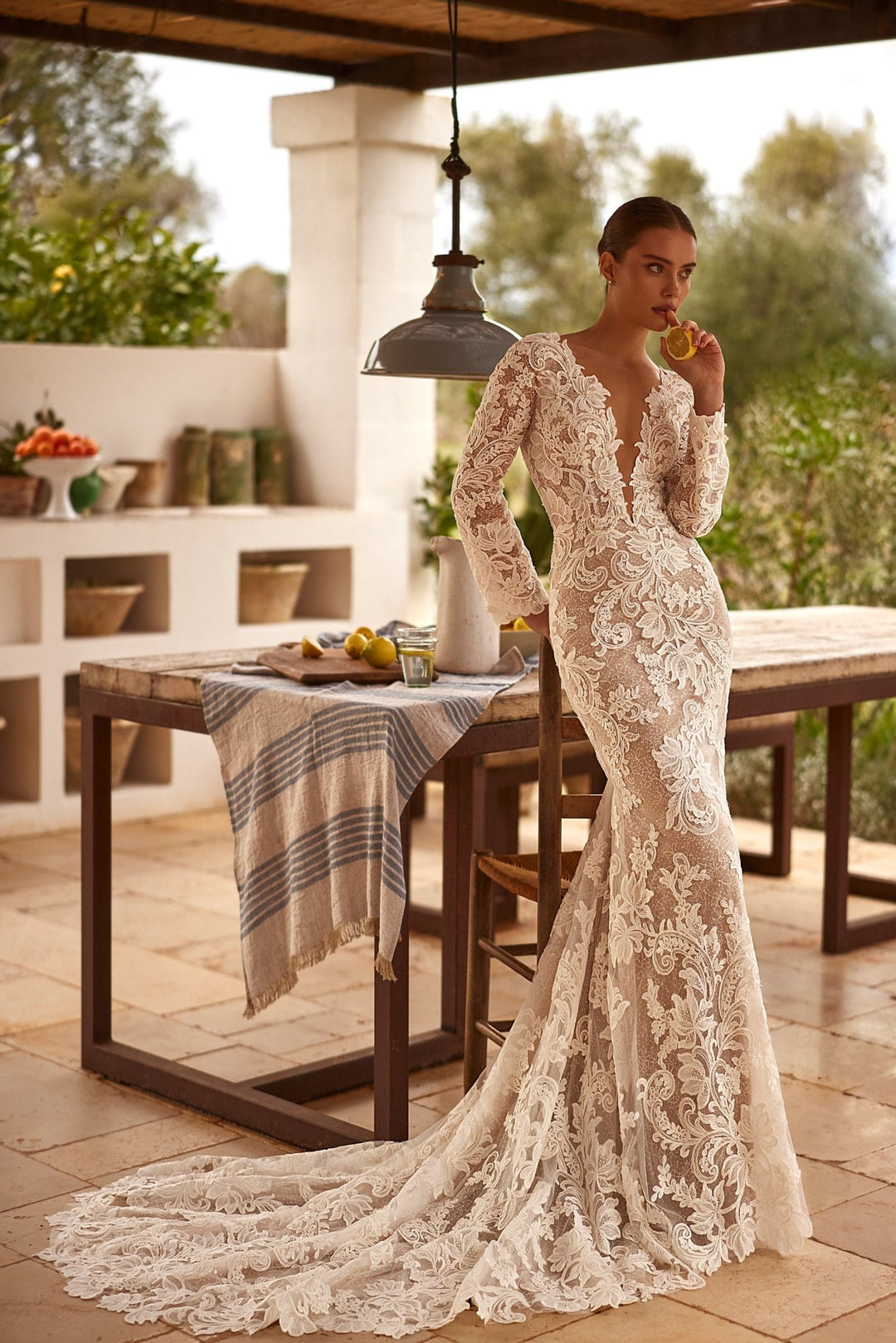 Sophisticated Lace Mermaid Wedding Gown with Deep V-Neck and Long Sleeves Plus Size - WonderlandByLilian