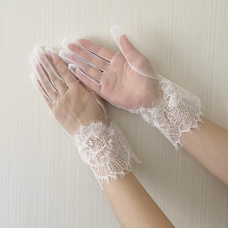 Sheer White Gloves with Intricate Lace Cuffs