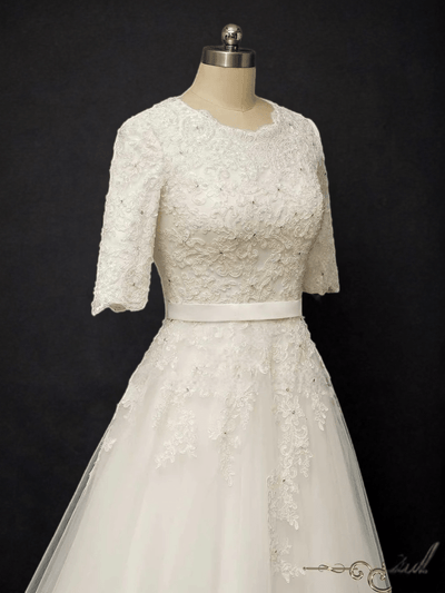 Timeless Elegance: Modest Lace Wedding Dress with Half Sleeves - WonderlandByLilian